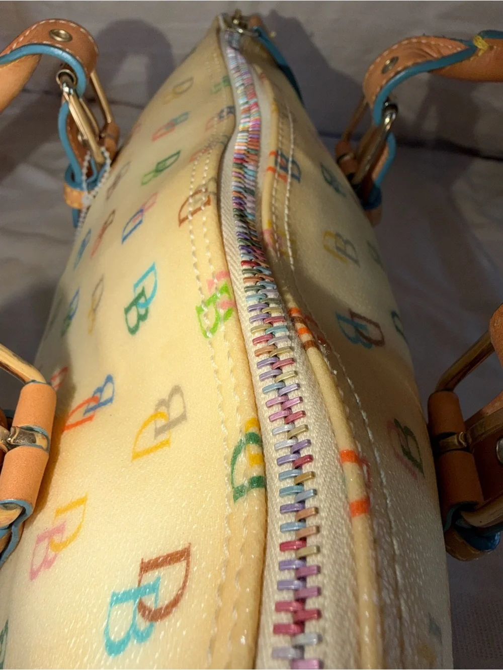 Dooney & Bourke Cream Multicolor DB Logo Satchel with Tan Trim